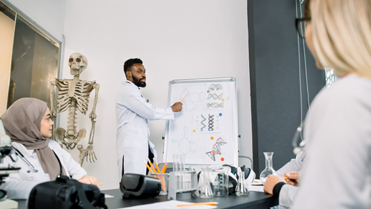 Scientist teaching in lab